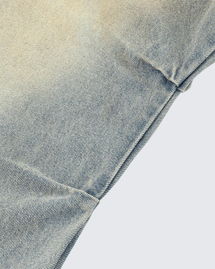 Wide-Leg Denim Jeans with Buttoned Hem - Image 9